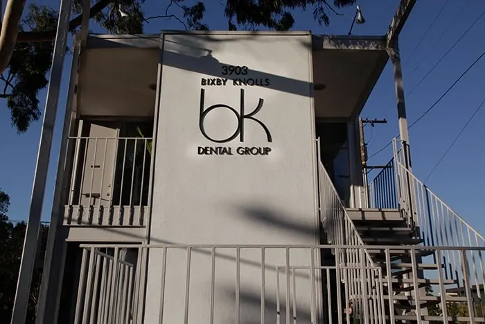 The Bixby Knolls Dental Group sign on the building at 3903 Long Beach Blvd.